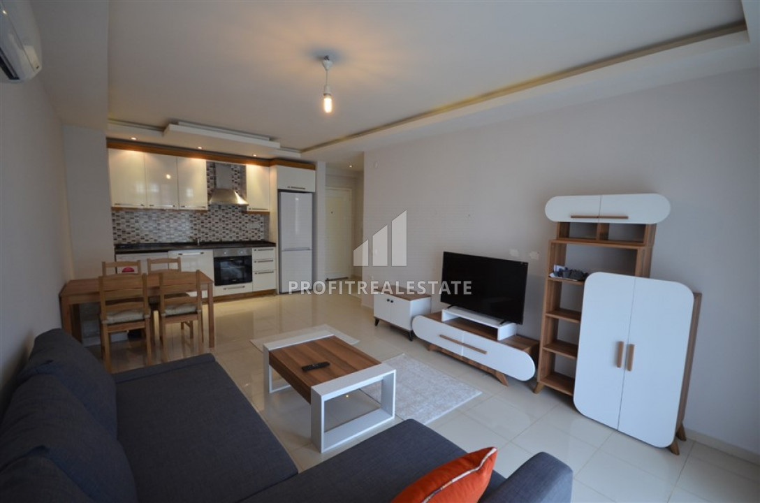 Apartment 1 + 1 with furniture and household appliances in a residence with a swimming pool in Oba ID-7301 фото-1