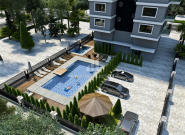 Новый проект для ваших инвестиций: квартиры разных планировок в 150м от моря в районе Каргыджак ID-7306 фото-2