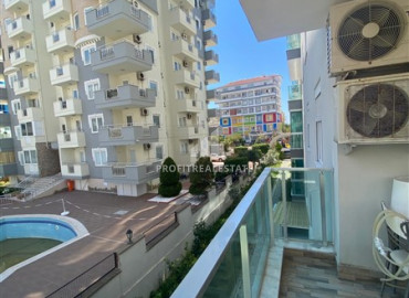 Cozy one-bedroom apartment in a residence with a swimming pool 200m from the sea in Mahmutlar ID-7312 фото-8