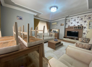 Large apartment with a separate kitchen and three balconies 150 meters from the sea in Davultepe, Mezitli ID-7333 фото-3