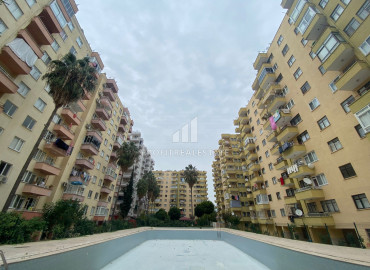 Large apartment with a separate kitchen and three balconies 150 meters from the sea in Davultepe, Mezitli ID-7333 фото-16