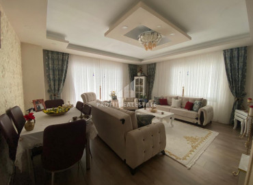 Large apartment 3 + 1 on a high floor with a separate kitchen 300m from the sea in Davulttepe, Mezitli ID-7334 фото-1