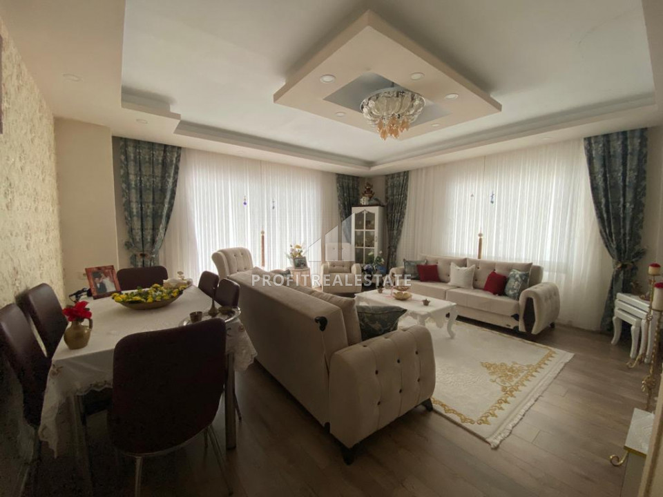 Large apartment 3 + 1 on a high floor with a separate kitchen 300m from the sea in Davulttepe, Mezitli ID-7334 фото-1