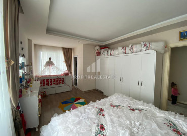 Large apartment 3 + 1 on a high floor with a separate kitchen 300m from the sea in Davulttepe, Mezitli ID-7334 фото-7