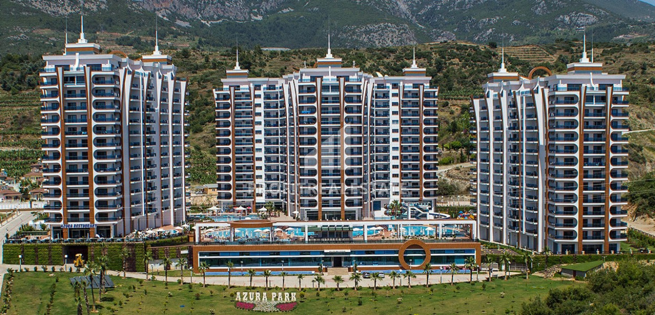 Furnished 2 + 1 apartment at a great price in an elite residence at the foot of the Taurus Mountains in Mahmutlar ID-7364 фото-1