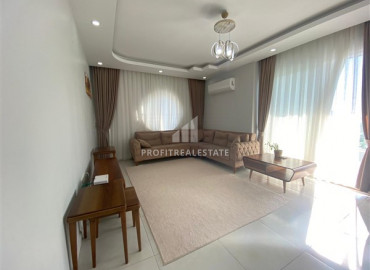 Furnished two-bedroom apartment on the central street of Mahmutlar, 400m from the sea ID-7411 фото-1}}