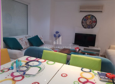 Two bedroom apartment, equipped with furniture and appliances, 50 meters from the sea, Mahmutlar, Alanya 110 m2 ID-7437 фото-4