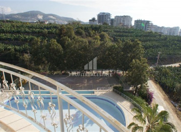 Inexpensive two-bedroom apartment in a picturesque area of Mahmutlar, Alanya, 120 m2 ID-7454 фото-1