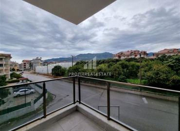 New two-bedroom apartment with mountain views in Alanya Oba at a bargain price ID-7455 фото-1