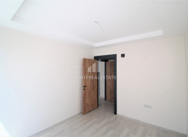 Spacious two-bedroom apartment in a new residence with a swimming pool, 250m from the sea in Mersin - Tece ID-7464 фото-7
