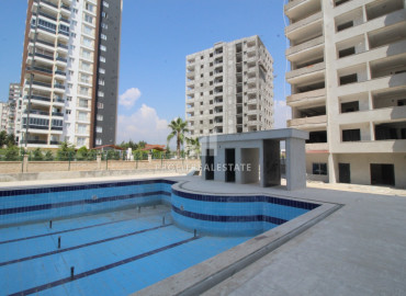 Spacious two-bedroom apartment in a new residence with a swimming pool, 250m from the sea in Mersin - Tece ID-7464 фото-14