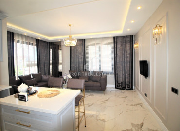 Новая трехкомнатная квартира в Соли, района Мезитли, недалеко от Средиземного моря по привлекательной цене ID-7465 фото-3