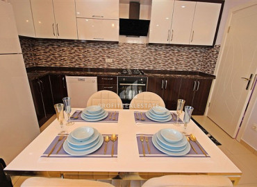 Apartment 2 + 1 in a residence with a swimming pool in the western part of Mahmutlar ID-7471 фото-14