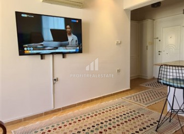 Budget one-bedroom apartment 250 meters from the sea, with furniture and household appliances in Mahmutlar ID-7473 фото-3