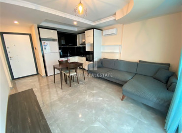 Уютная двухкомнатная квартира в резиденции с бассейном в 450 метрах от пляжа района Махмутлар ID-7477 фото-1