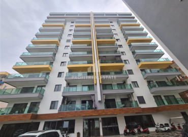 Трехкомнатные апартаменты в новом жилом комплексе, на первой береговой линии, Махмутлар, Аланья, 85 м2 ID-7480 фото-1