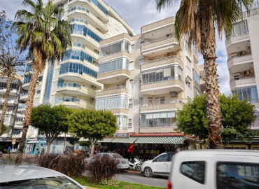 Furnished apartment 2 + 1 with a separate kitchen on the main street of Mahmutlar, 150m from the sea ID-7496 фото-1