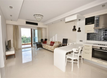Большая квартира 1+1 по отличной цене в элитном комплексе у подножия Торосских гор в Махмутларе ID-7540 фото-2
