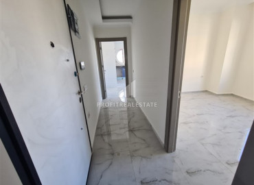 Species apartment 1 + 1 in a new residence with good facilities by the sea in Mahmutlar ID-7544 фото-6