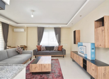 Видовая двухкомнатная квартира с мебелью и бытовой техникой в комплексе с инфраструктурой в центре Алании ID-7557 фото-2