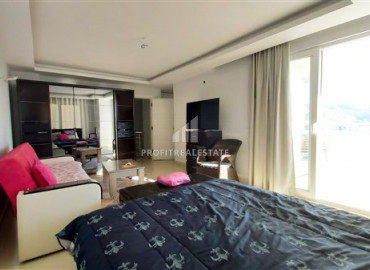 Меблированный дуплекс с тремя спальнями и потрясающим видом, недалеко от моря в Махмутларе ID-7558 фото-7