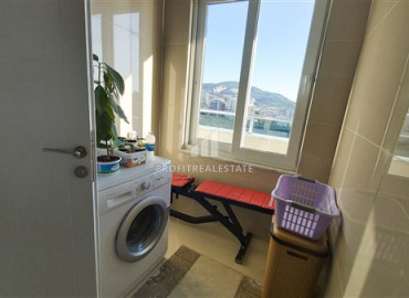 Меблированный дуплекс с тремя спальнями и потрясающим видом, недалеко от моря в Махмутларе ID-7558 фото-8