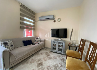 Gasified three bedroom apartment with a separate kitchen in Teje, Mersin, 300m from the sea at an attractive price ID-7587 фото-2