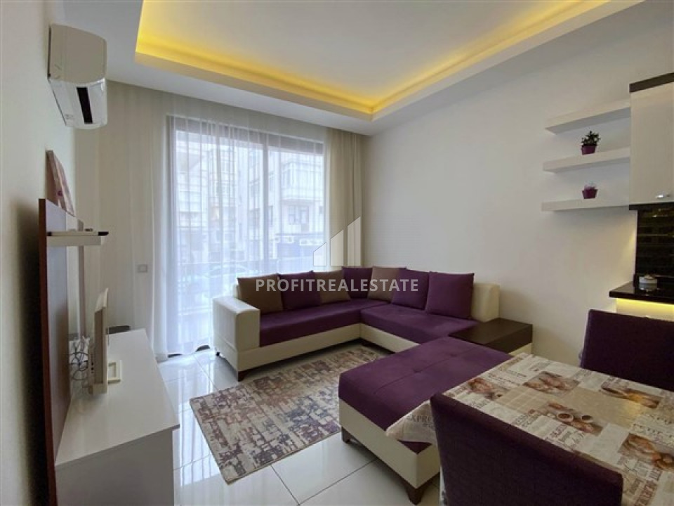 Furnished 1 + 1 apartment in a new building in the center of Alanya, in a residence with good facilities. ID-7613 фото-1