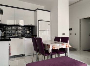 Furnished 1 + 1 apartment in a new building in the center of Alanya, in a residence with good facilities. ID-7613 фото-3