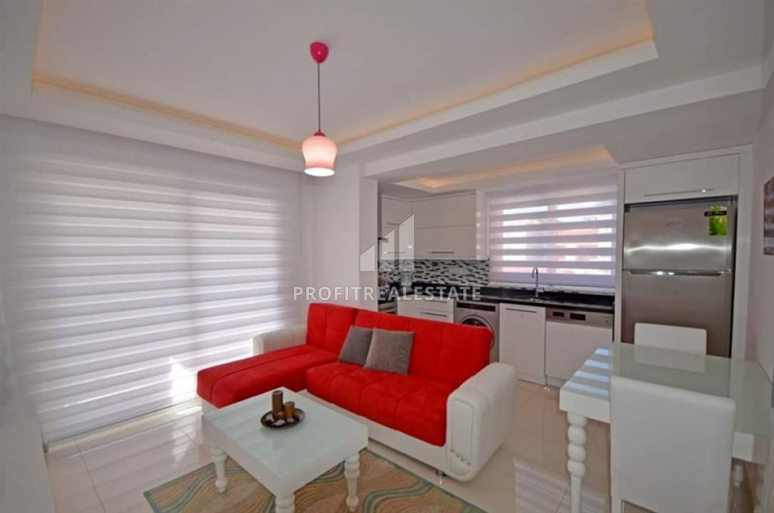 Furnished view one-bedroom apartment in the heart of Alanya in a modern building with facilities ID-7629 фото-1