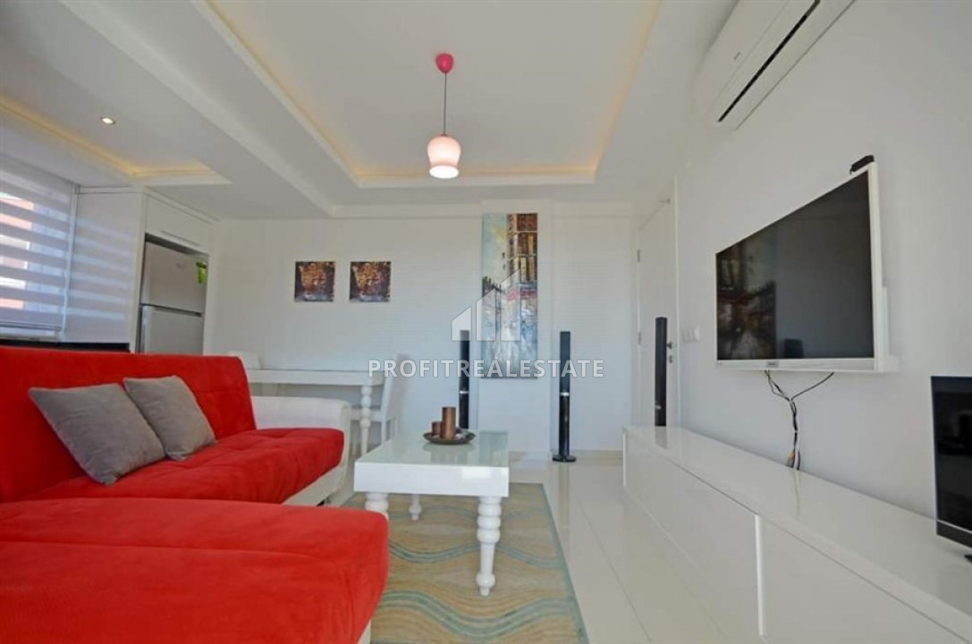 Furnished view one-bedroom apartment in the heart of Alanya in a modern building with facilities ID-7629 фото-2