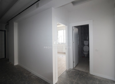 New large two bedroom apartment in Soli, Mezitli district, at an attractive price ID-7670 фото-10