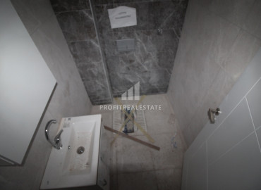 New large two bedroom apartment in Soli, Mezitli district, at an attractive price ID-7670 фото-12