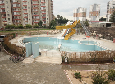 New apartment 1 + 1 in Teje, Mersin, in a residence with good facilities, 300m from the sea ID-7683 фото-1