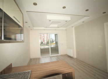 New apartment 1 + 1 in Teje, Mersin, in a residence with good facilities, 300m from the sea ID-7683 фото-5