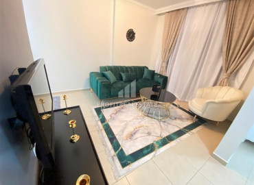 Cozy one bedroom apartment, equipped with furniture and appliances, in a comfortable residential residence Mahmutlar, Alanya, 48 m2 ID-7739 фото-1