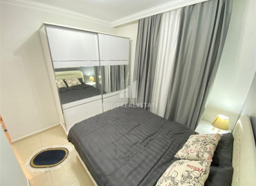 Уютные двухкомнатные апартаменты, укомплектованные мебелью и техникой, в благоустроенном жилом комплексе Махмутлара, Аланья, 48 м2 ID-7739 фото-5