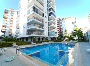 Two bedroom apartment in a residence with a swimming pool, 300 meters from the sea in Mahmutlar ID-7812 фото-1
