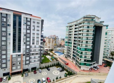 Furnished view apartment with three bedrooms and a separate kitchen in the new residence of Mahmutlar ID-7863 фото-21