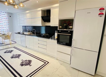 Furnished view apartment with three bedrooms and a separate kitchen in the new residence of Mahmutlar ID-7863 фото-2