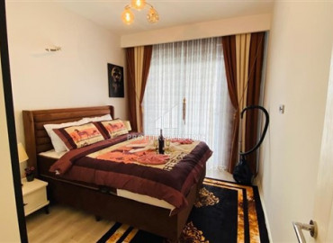 Furnished view apartment with three bedrooms and a separate kitchen in the new residence of Mahmutlar ID-7863 фото-4