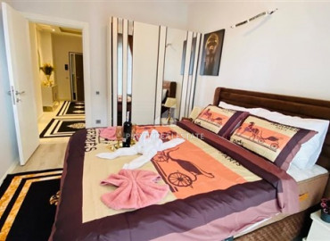 Furnished view apartment with three bedrooms and a separate kitchen in the new residence of Mahmutlar ID-7863 фото-5