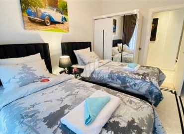 Furnished view apartment with three bedrooms and a separate kitchen in the new residence of Mahmutlar ID-7863 фото-6