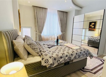 Furnished view apartment with three bedrooms and a separate kitchen in the new residence of Mahmutlar ID-7863 фото-7