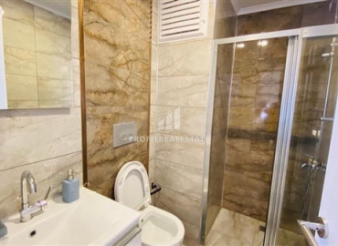 Furnished view apartment with three bedrooms and a separate kitchen in the new residence of Mahmutlar ID-7863 фото-9