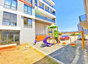 Furnished view apartment with three bedrooms and a separate kitchen in the new residence of Mahmutlar ID-7863 фото-12