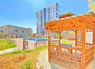 Furnished view apartment with three bedrooms and a separate kitchen in the new residence of Mahmutlar ID-7863 фото-17