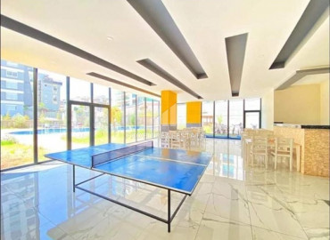 Furnished view apartment with three bedrooms and a separate kitchen in the new residence of Mahmutlar ID-7863 фото-18