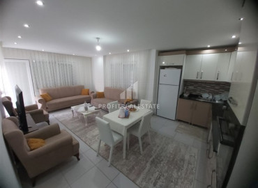 Two bedroom furnished apartment in a residence with a swimming pool, by the sea in Mahmutlar ID-7866 фото-1