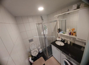 Two bedroom furnished apartment in a residence with a swimming pool, by the sea in Mahmutlar ID-7866 фото-8